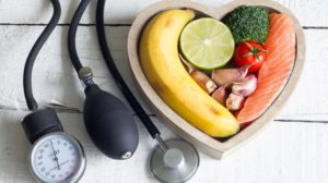 Foods that Lower Blood Pressure _ Food and healthy heart diet with blood pressure gauge _ Foods for Lower Blood Pressure