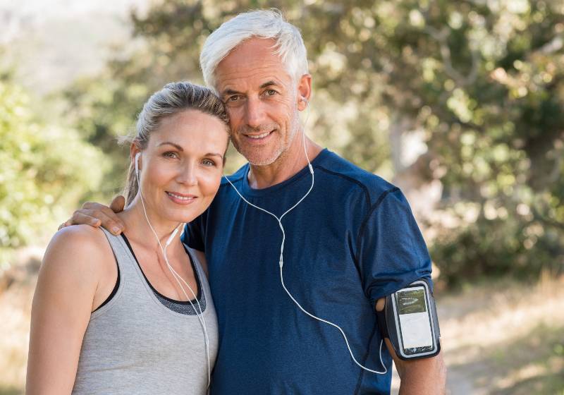 Happy mature couple relaxing after jogging in the park | Psyllium Husk can boost immunity and fight disease.