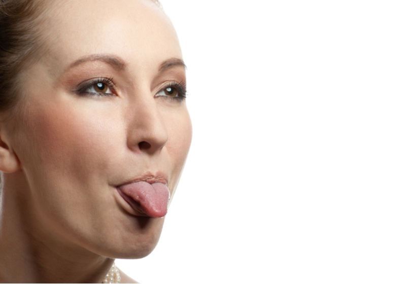 Pink Tongue | Healthy Tongue Color Meaning _ Fresh clear healthy skin on the face of beautiful woman