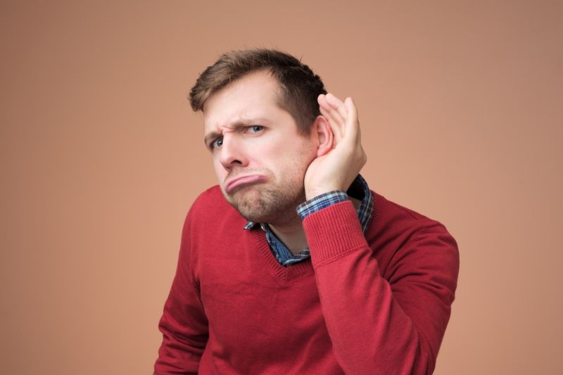 young-european-man-red-sweater-trying Signs of Dementia